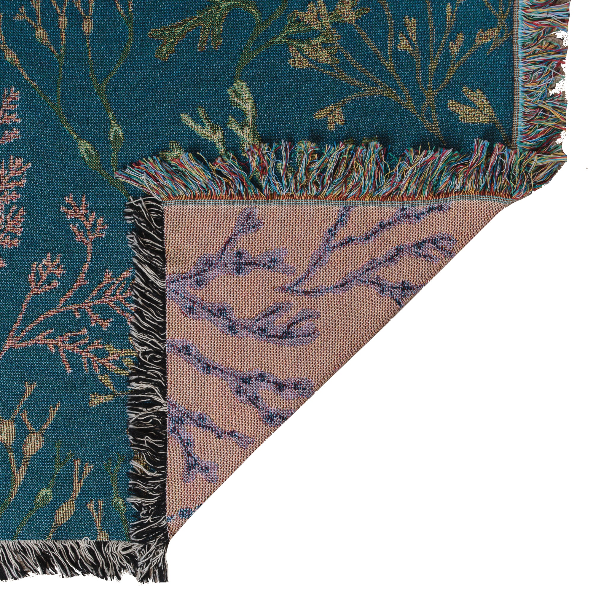 Woven blanket with fringe with delicate seaweed design in blue, green and pink