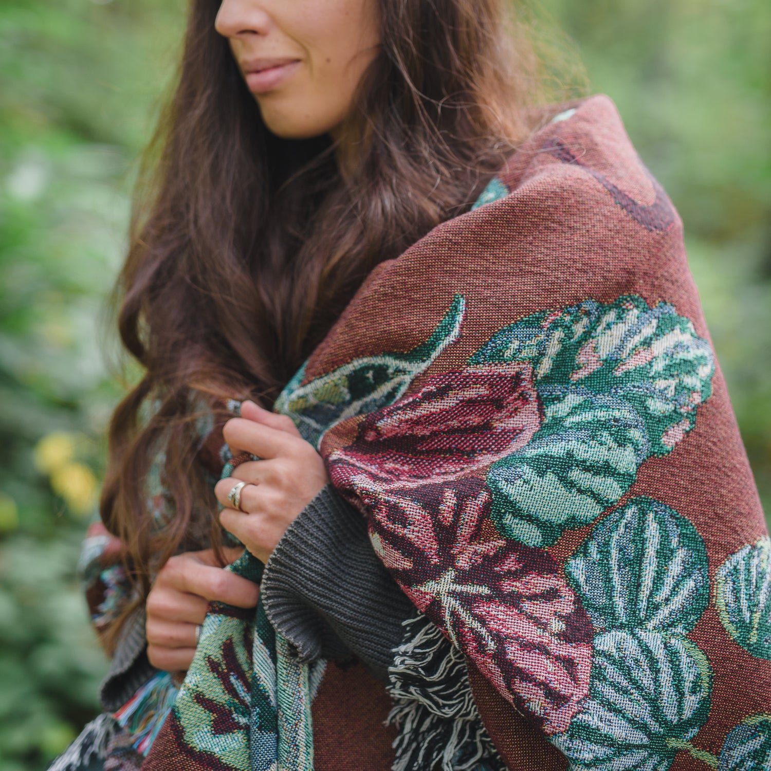 woven throw blanket wrapped around shoulders