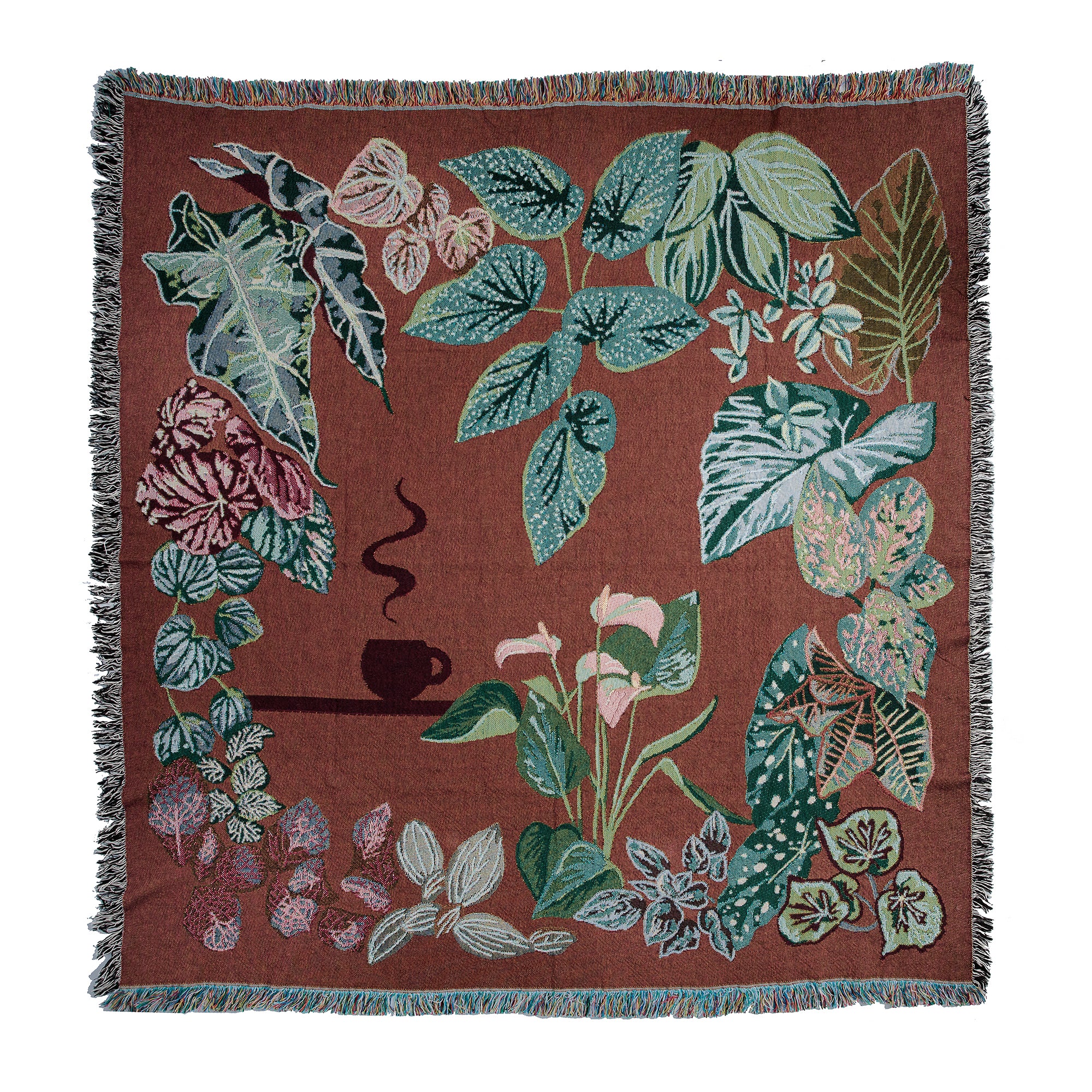 Burgandy woven throw blanket showing houseplants and a tea cup.