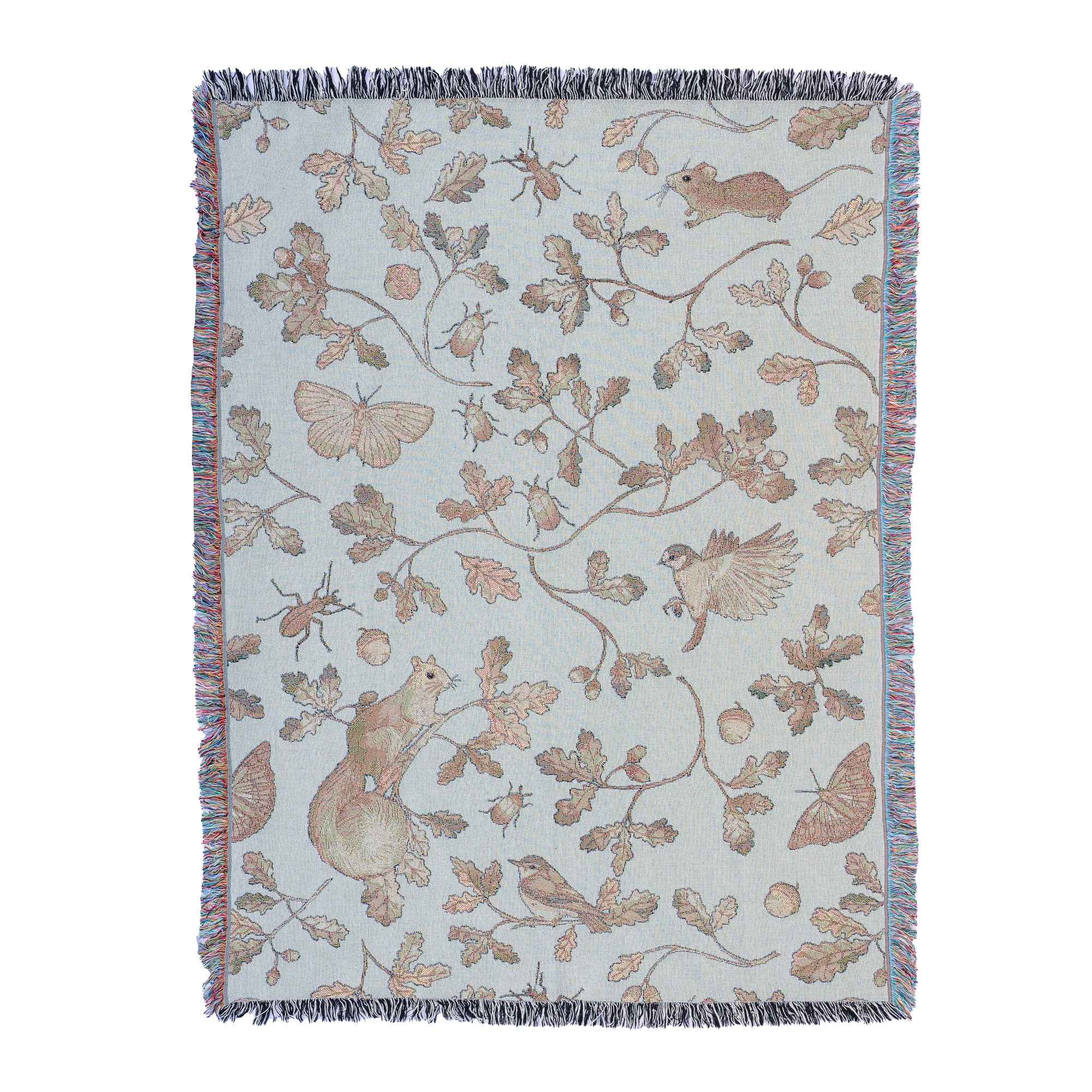 An Arcana Wild Oak Wrap Blanket with a floral pattern.