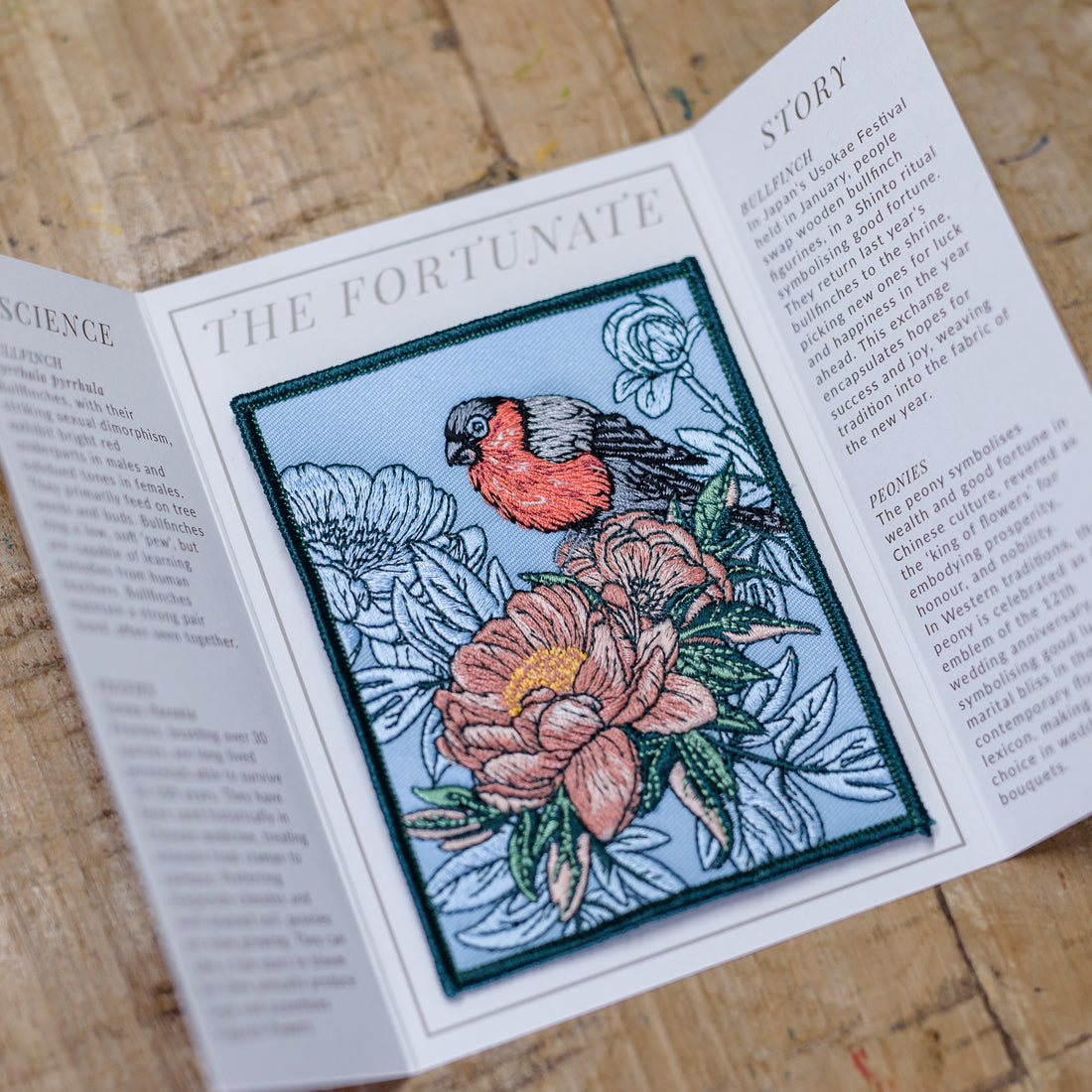 Bullfinch and Peony Flowers Embroidered Patch in gatefold card with science and story behind the species