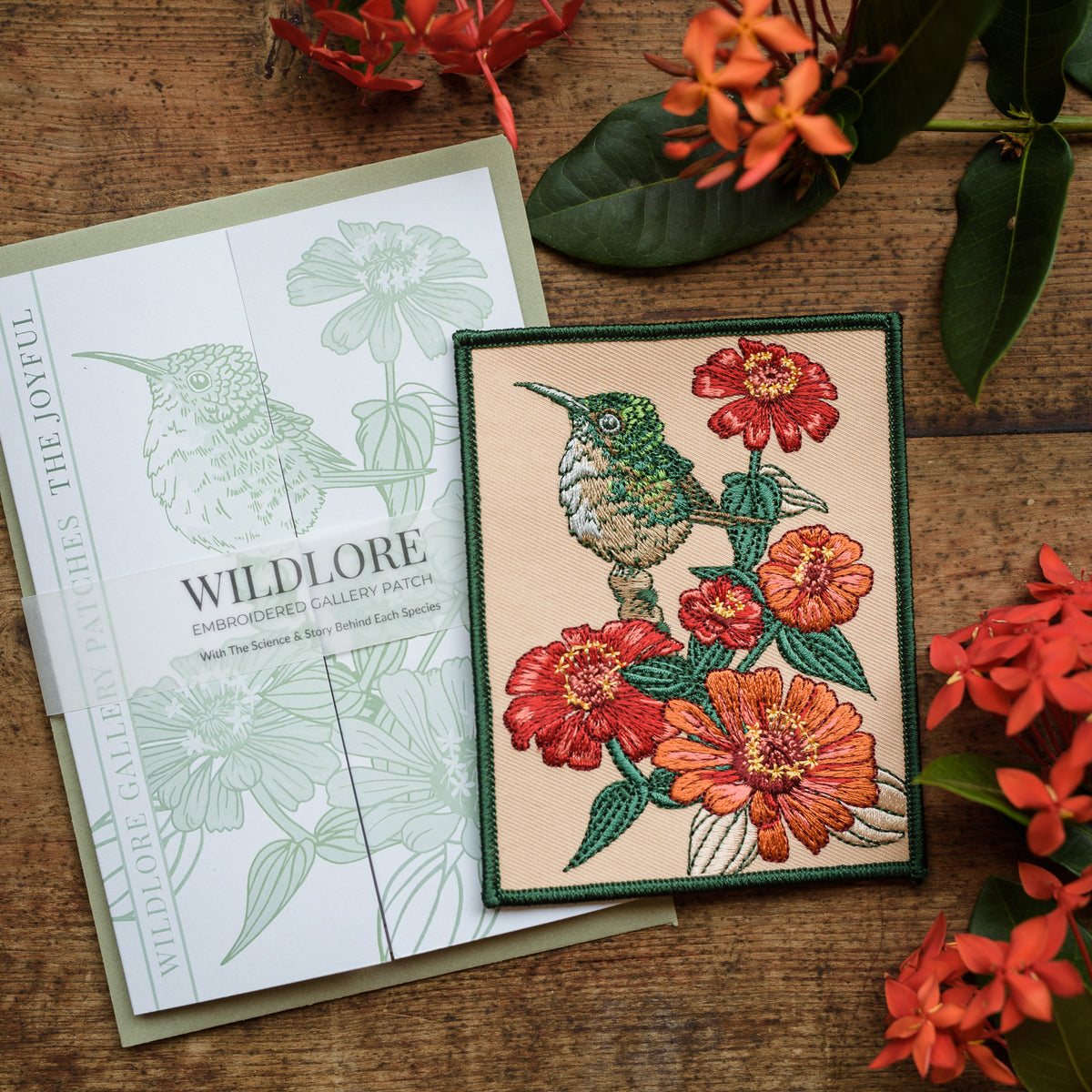 Hummingbird and Zinnia Embroidered Patch in gatefold card with science and story behind the species