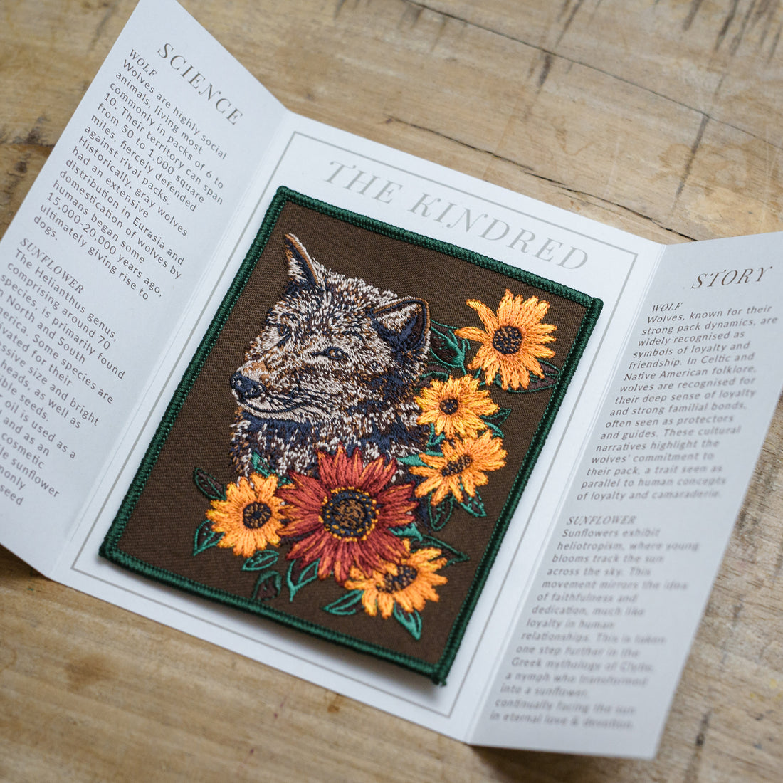 Grey Wolf and Sunflower Embroidered Patch in gatefold card with science and story behind the species